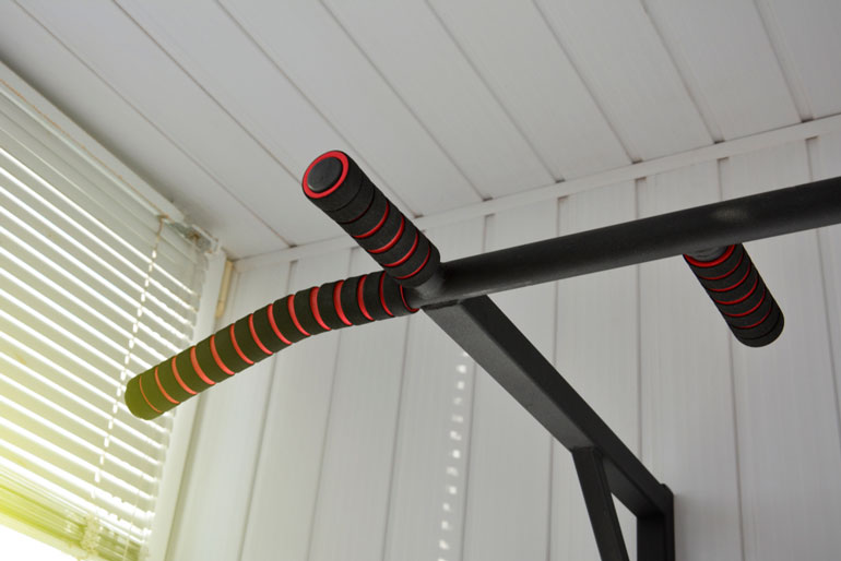 pull up bar with handles attached to the wall