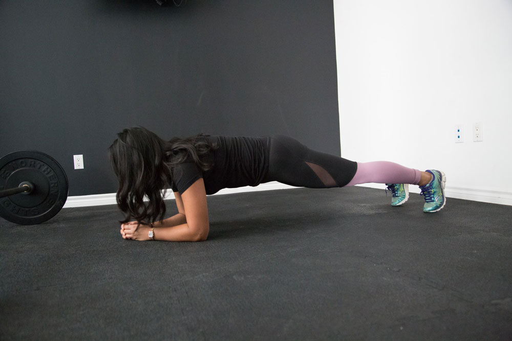 woman doing Plank Jack at gym
